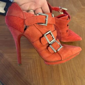 Red leather heels with buckle